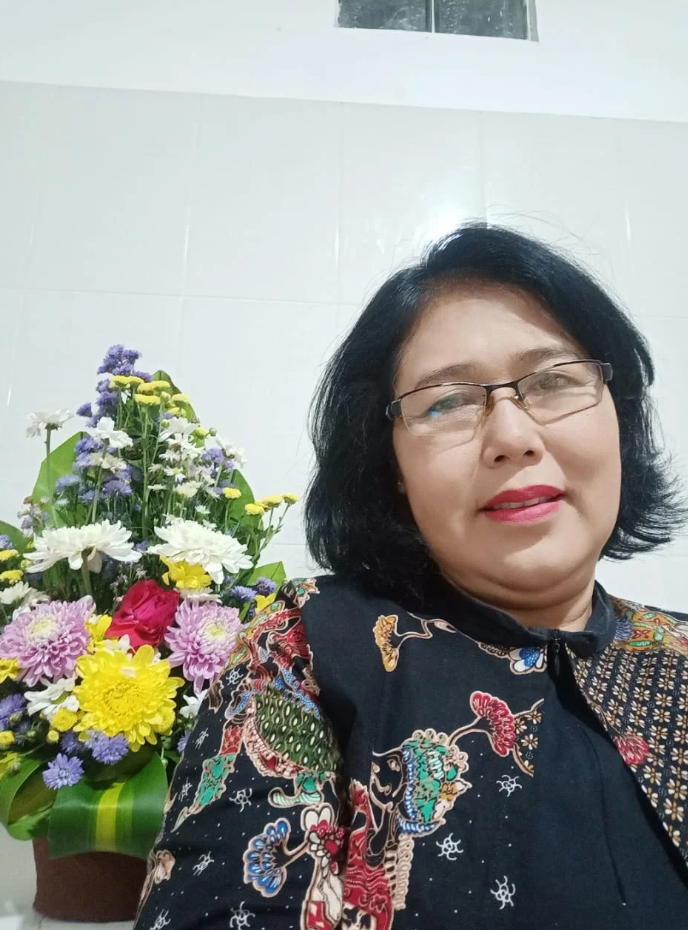 Dr.  Dra. Ni Ketut Ratna Erawati, M. Hum.